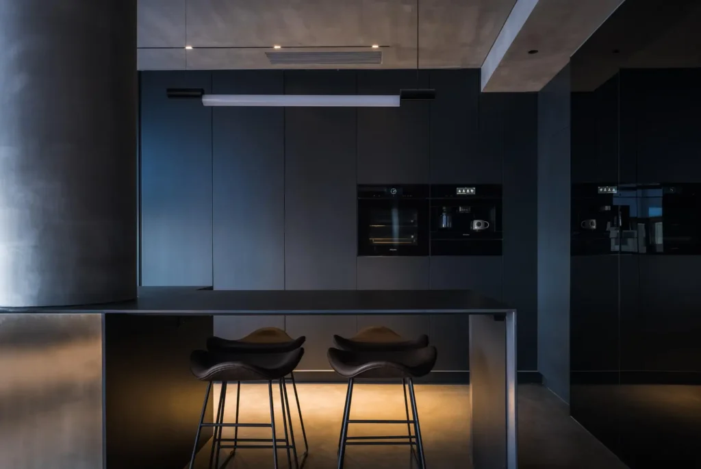 modern-minimalist-kitchen-interior-with-dark-cabinetry-island